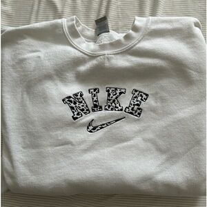 Nike cow print crew neck
